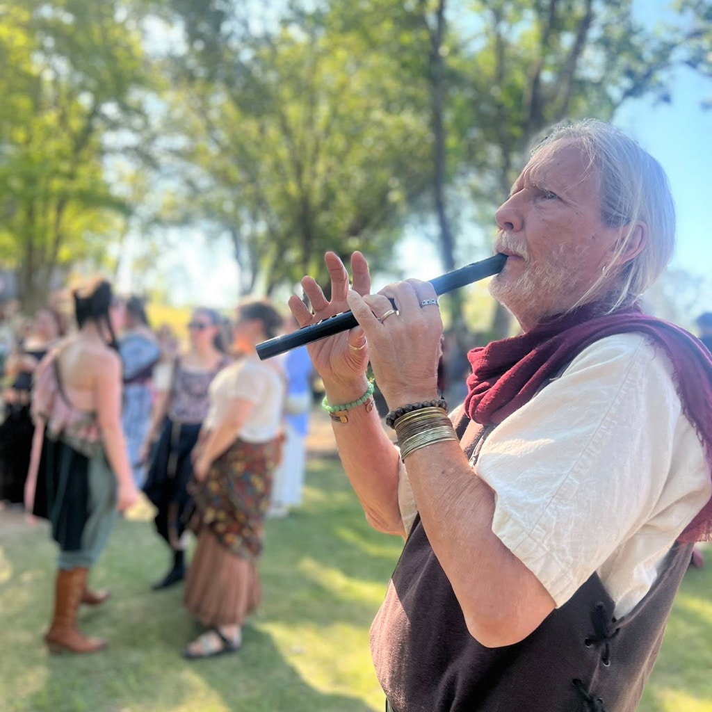 Larry Dearing playing outside the front gates of the GA Renaissance Festival